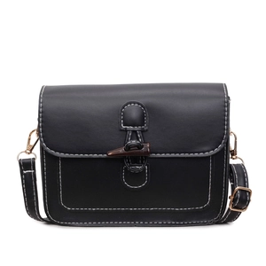 Retro black square crossbody bag with white contrast stitching and a horn button closure