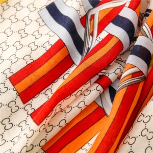 Detailed macro view of cotton linen scarf texture with classic logo pattern and stripes