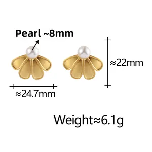 Macro detail of brushed gold flower earrings with 8mm shell pearl and size measurements