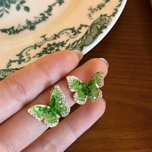 Elegant butterfly crystal stud earrings with green rhinestones and golden base for women