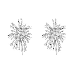Close-up of silver starburst earrings with sparkling cubic zirconia inlay in white background
