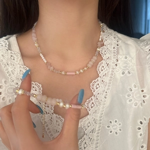 Pink crystal and freshwater pearl beaded necklace set with gold accents for women
