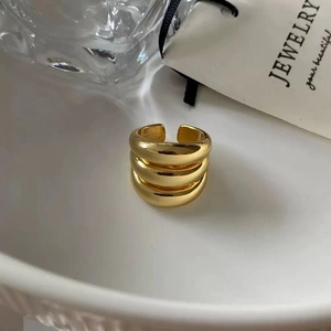 Polished gold multi-layer open ring featuring three stacked thick bands in retro style