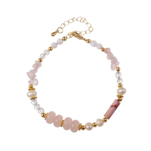 Detail of pink crystal and freshwater pearl necklace with adjustable gold clasp