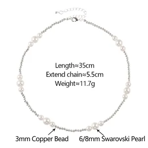 Elegant beaded necklace with white pearls and silver copper beads on white background