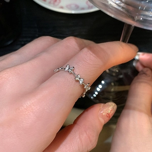Elegant butterfly zircon ring in silver finish worn on hand for stylish women