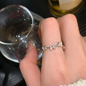Elegant silver butterfly ring with micro-pave zircons and twisted rope texture band
