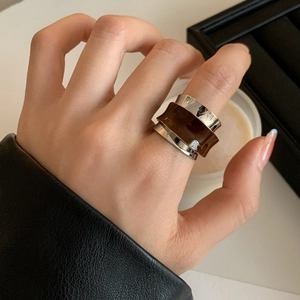 French vintage irregular double-layer silver and brown ring on model's hand
