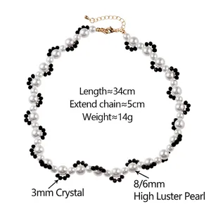 Elegant 34cm pearl and black crystal necklace with adjustable gold extension chain