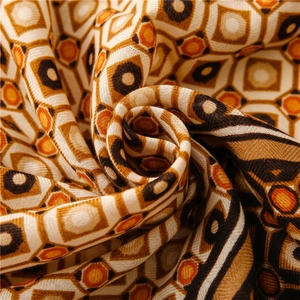 Macro detail of geometric diamond pattern scarf fabric with cotton linen texture