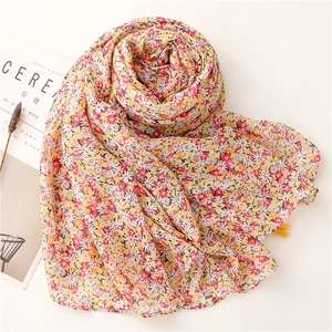 Floral soft cotton scarf for women with yellow flower print and elegant tassel fringe