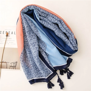 Floral and leopard print cotton linen scarf with orange borders and blue tassels