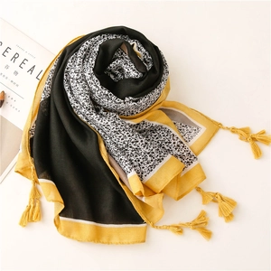 Long cotton linen scarf with color block pattern, leopard print accents, and tassels