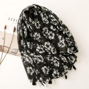 Lightweight black floral scarf with fringe trim and tropical pattern for women