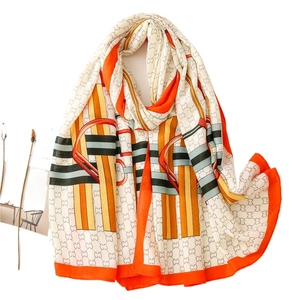 Lightweight long scarf with orange chain pattern and intertwined double C design