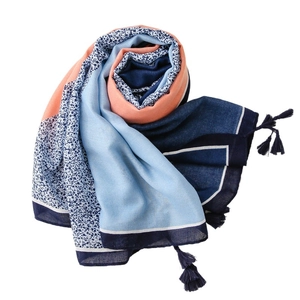 Women's cotton linen scarf with leopard print, color block design, and blue fringe tassels