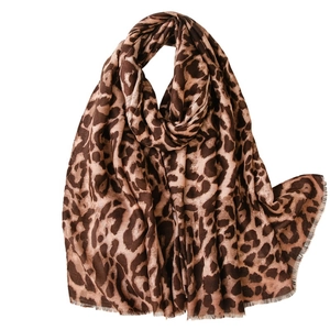 Classic brown leopard print scarf with soft fringe edges and premium linen texture