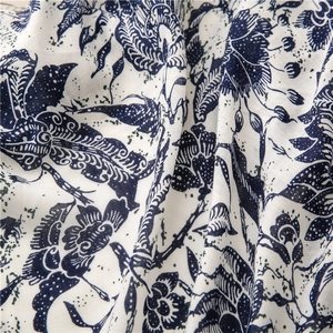 Close-up of blue and white floral porcelain print on soft cotton linen ethnic scarf