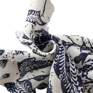 Exotic vintage floral cotton scarf featuring blue botanical leaf patterns on beige fabric