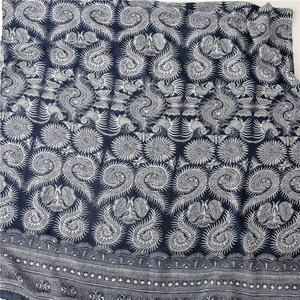 Detailed blue and white exotic batik print on a vintage ethnic style long cotton scarf