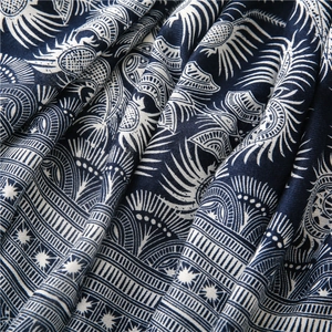 Detailed macro view of exotic blue and white porcelain patterned cotton linen scarf fabric
