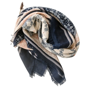 Ethnic geometric print linen scarf with fringe edges and navy blue orange patterns