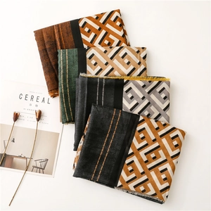 Thick geometric jacquard scarves with fringe edge in four assorted color patterns