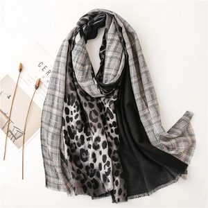 Leopard and houndstooth patchwork scarf with frayed edges for a stylish look