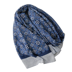 Navy blue kaleidoscope print linen-feel scarf with vintage floral patterns on white background