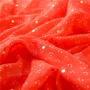 Red cotton linen scarf with gold sequins and white paw prints for beach travel