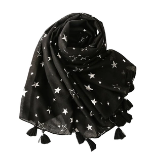 Lightweight black linen cotton scarf with silver star prints and fringe tassels