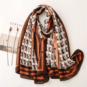 Carriage print scarf in brown and orange cotton-linen blend with striped borders