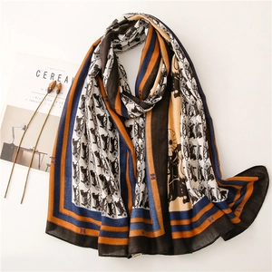 Detail of vintage carriage print scarf with premium cotton-linen texture and rich folds