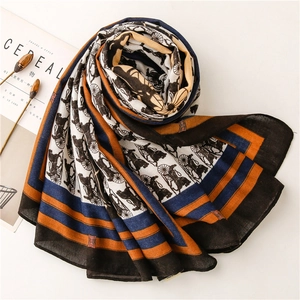 Flat lay of retro horse carriage print scarf with premium cotton linen texture