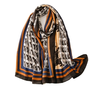 Fashion scarf featuring horse carriage chain print and contrast border for beach travel