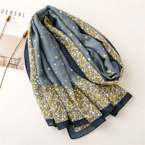Floral dusty blue cotton linen scarf with yellow flower patterns for sun protection
