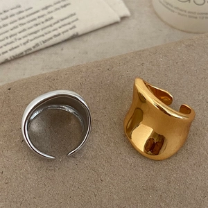 Minimalist asymmetric wide open rings in polished gold and silver finishes