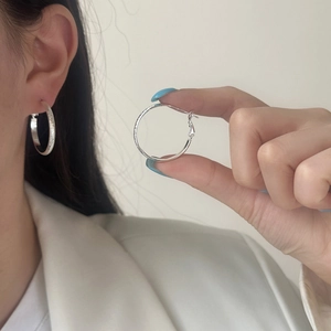Chic silver textured hoop earrings featuring a mix of matte glitter and polished finishes