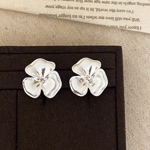 Elegant vintage silver brushed flower stud earrings with sparkling cubic zirconia centers