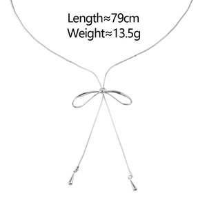 Silver bow necklace with long tassels and teardrop pendants, 79cm length and 13.5g weight