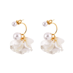 Elegant white petal tassel earrings with luxury pearls and gold hooks on white background