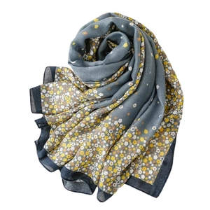 Long dusty blue floral scarf with yellow flowers and fine texture for sun protection