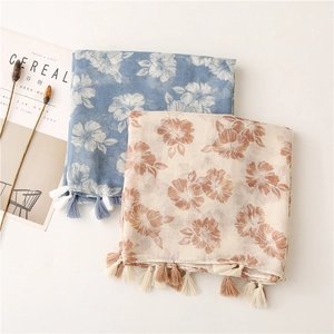 Floral cotton linen scarf with soft fringe tassels in gray-blue and beige cream colors