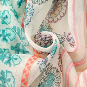 Soft cotton linen scarf with bohemian floral stripes for women as a sun protection shawl