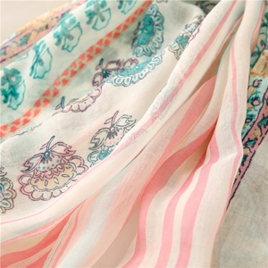 Detail of soft striped and floral contrast pattern on lightweight voile scarf shawl