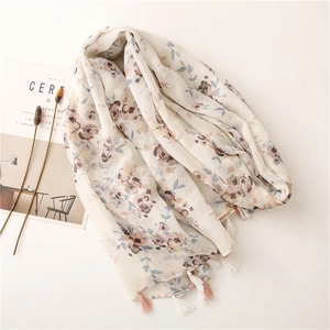 Floral voile scarf with white flowers and pink tassels for summer sun protection