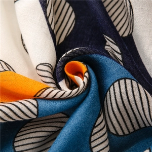 Macro shot of abstract geometric print on breathable cotton linen scarf fabric detail