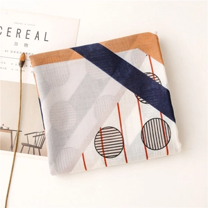 Detailed view of lightweight cotton linen scarf with abstract geometric patterns