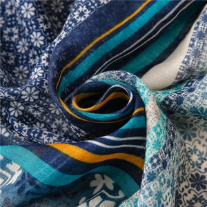 Bohemian geometric pattern scarf in navy blue and ginger yellow with cotton-linen texture