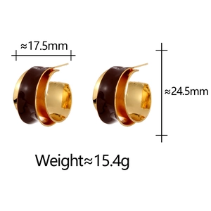 Close-up of vintage gold C-shape earrings with red enamel detailing and dimension measurements